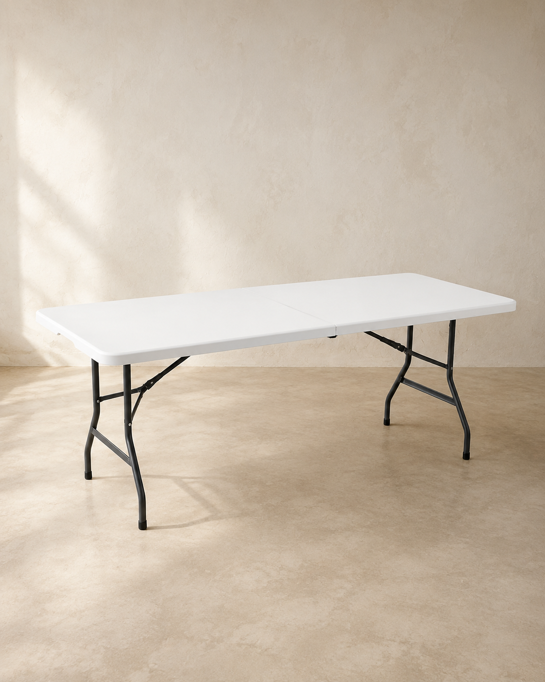 White rectangular folding banquet table with black legs